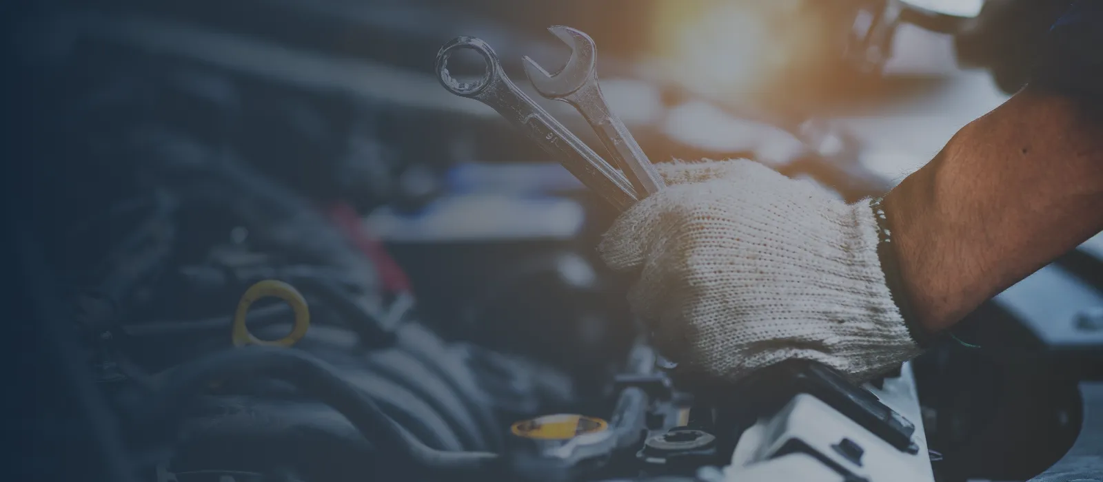 Mechanic working at Carranza's Car Care in Waukegan